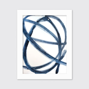 A blue and white abstract print in an unmatted white frame hangs on a white wall.