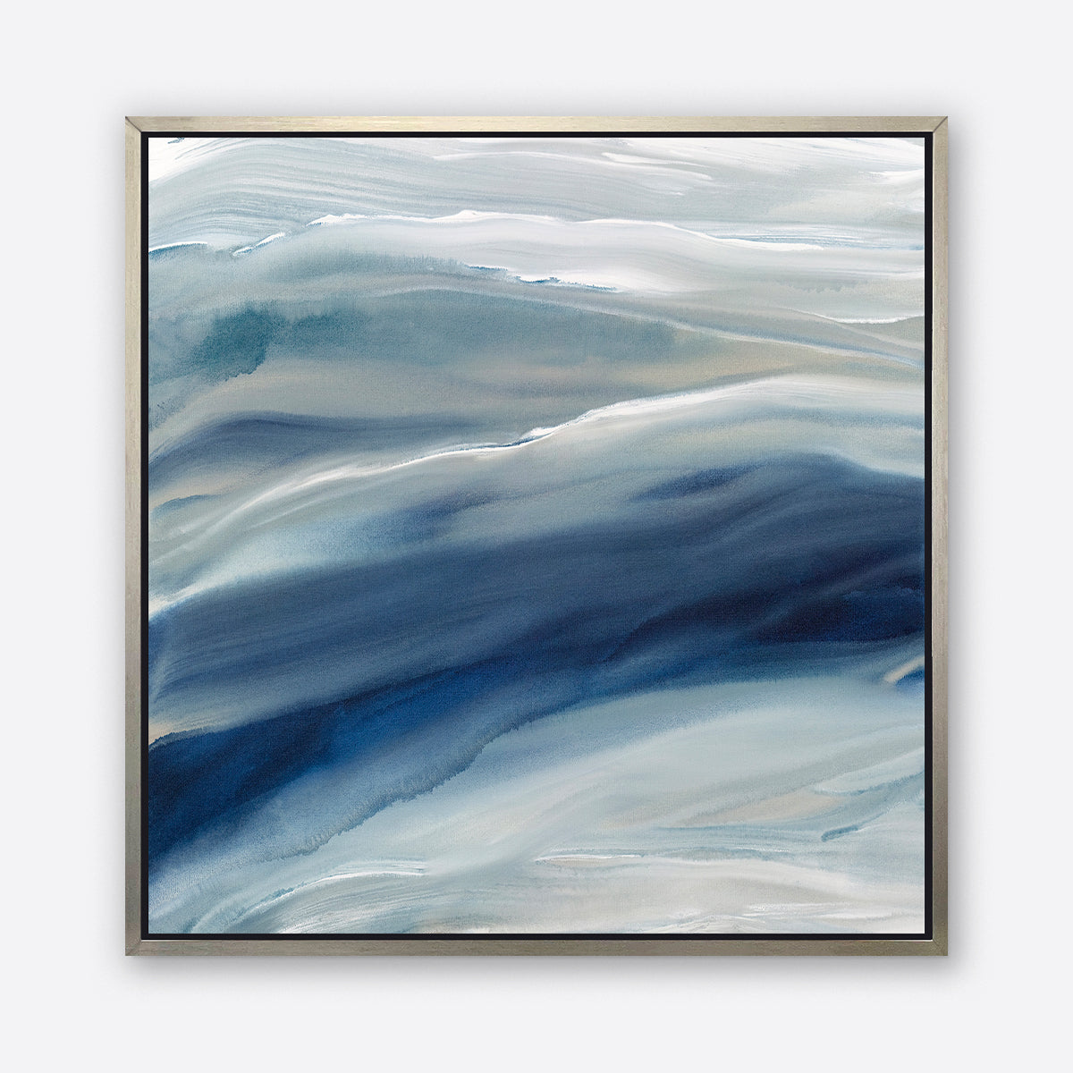 A blue, teal, beige and white abstract print in a silver floater frame hangs on a white wall.