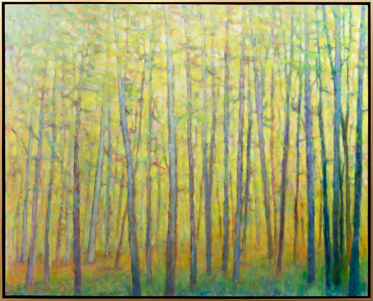 A yellow abstracted forest trees painting framed in a thin gold floater frame.