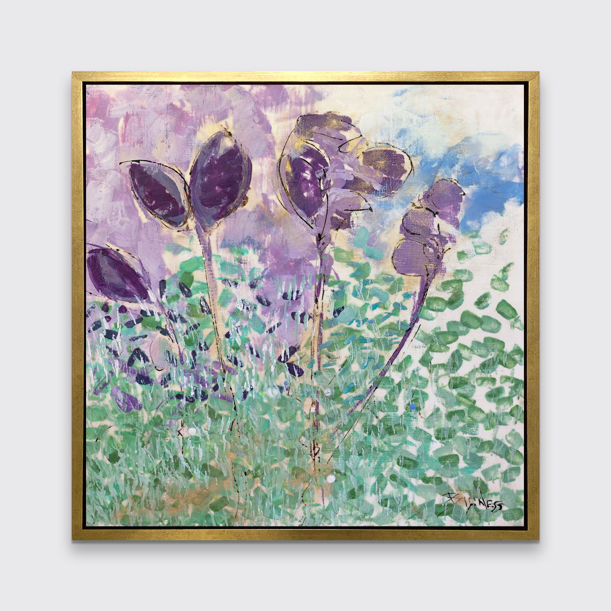 A purple, green and blue abstract floral print in a gold floater frame hangs on a white wall.