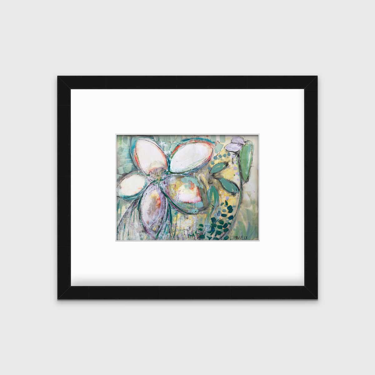An abstract floral print in a black frame with a mat hangs on a white wall.