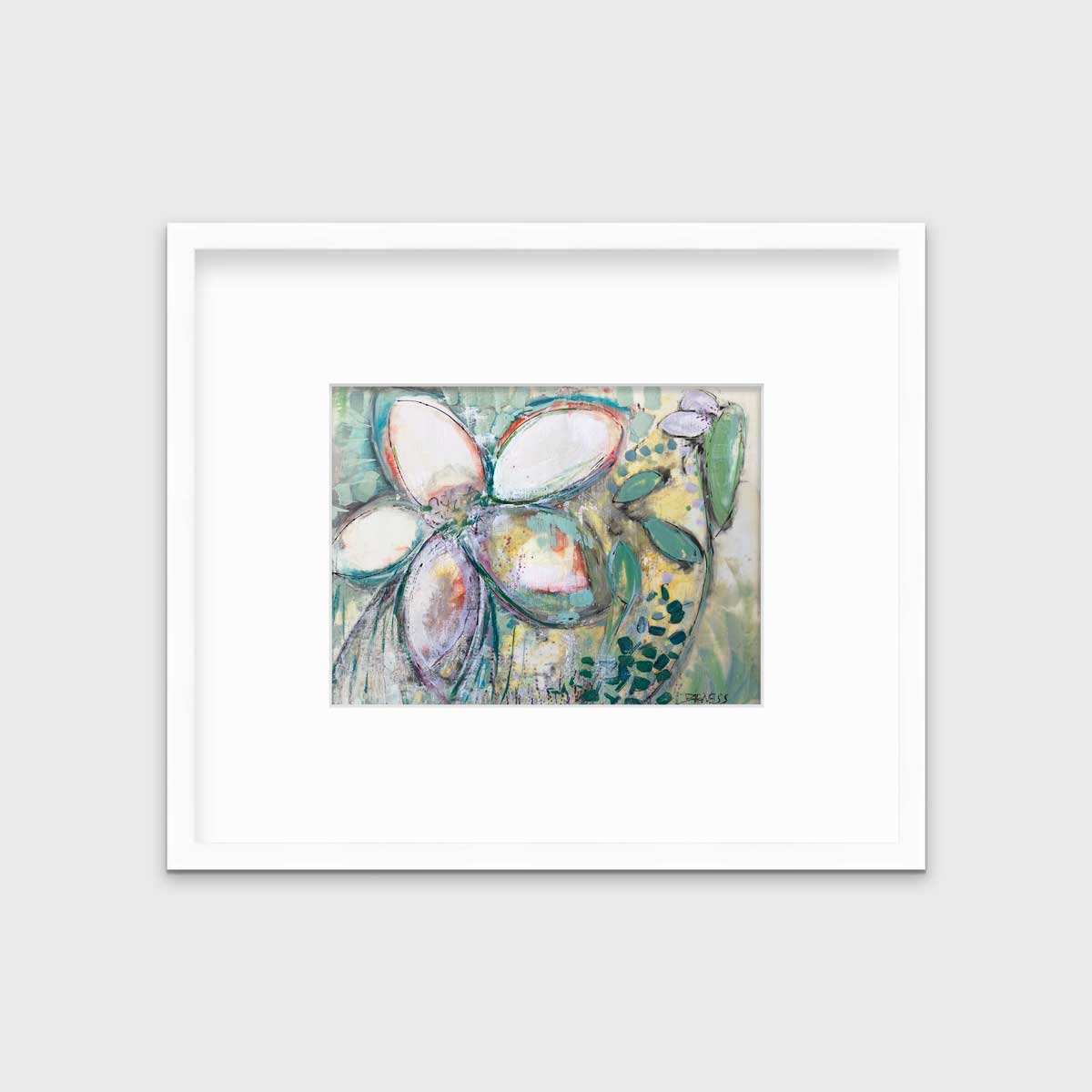 An abstract floral print in a white frame with a mat hangs on a white wall.