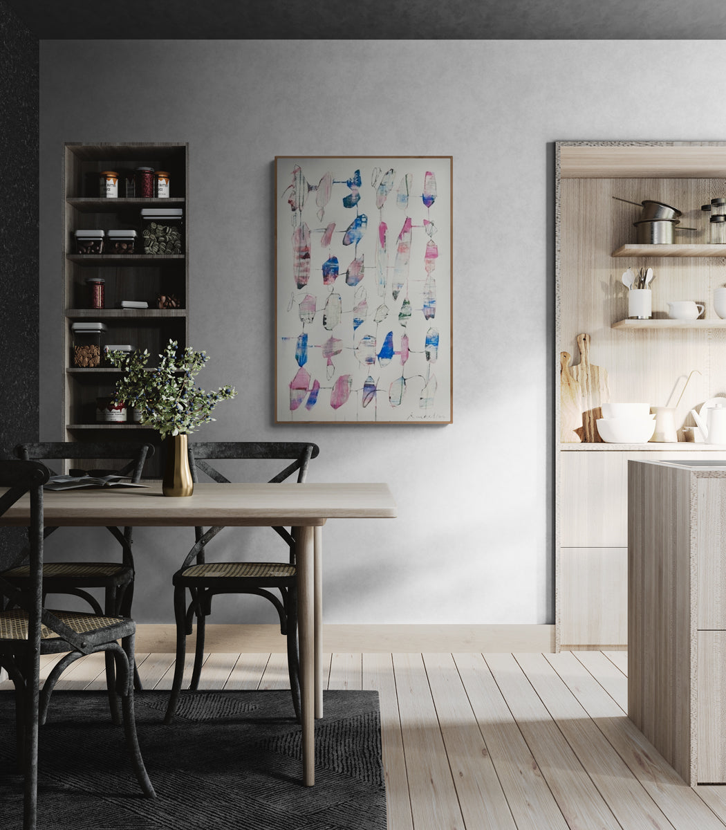 Modern kitchen with dining area, abstract art on the wall, and open shelving.