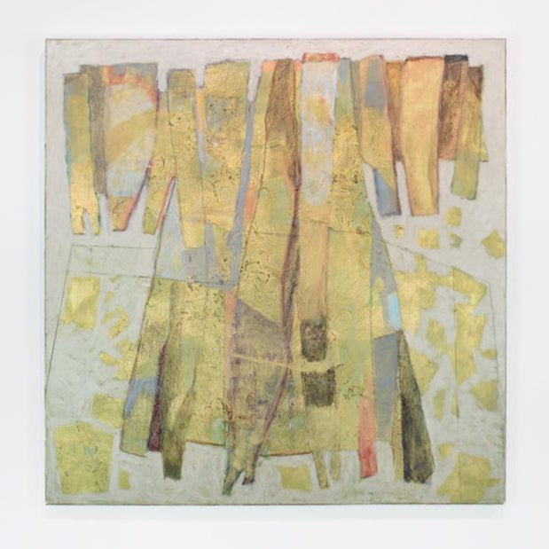 A metallic abstract painting hangs on a white wall. 