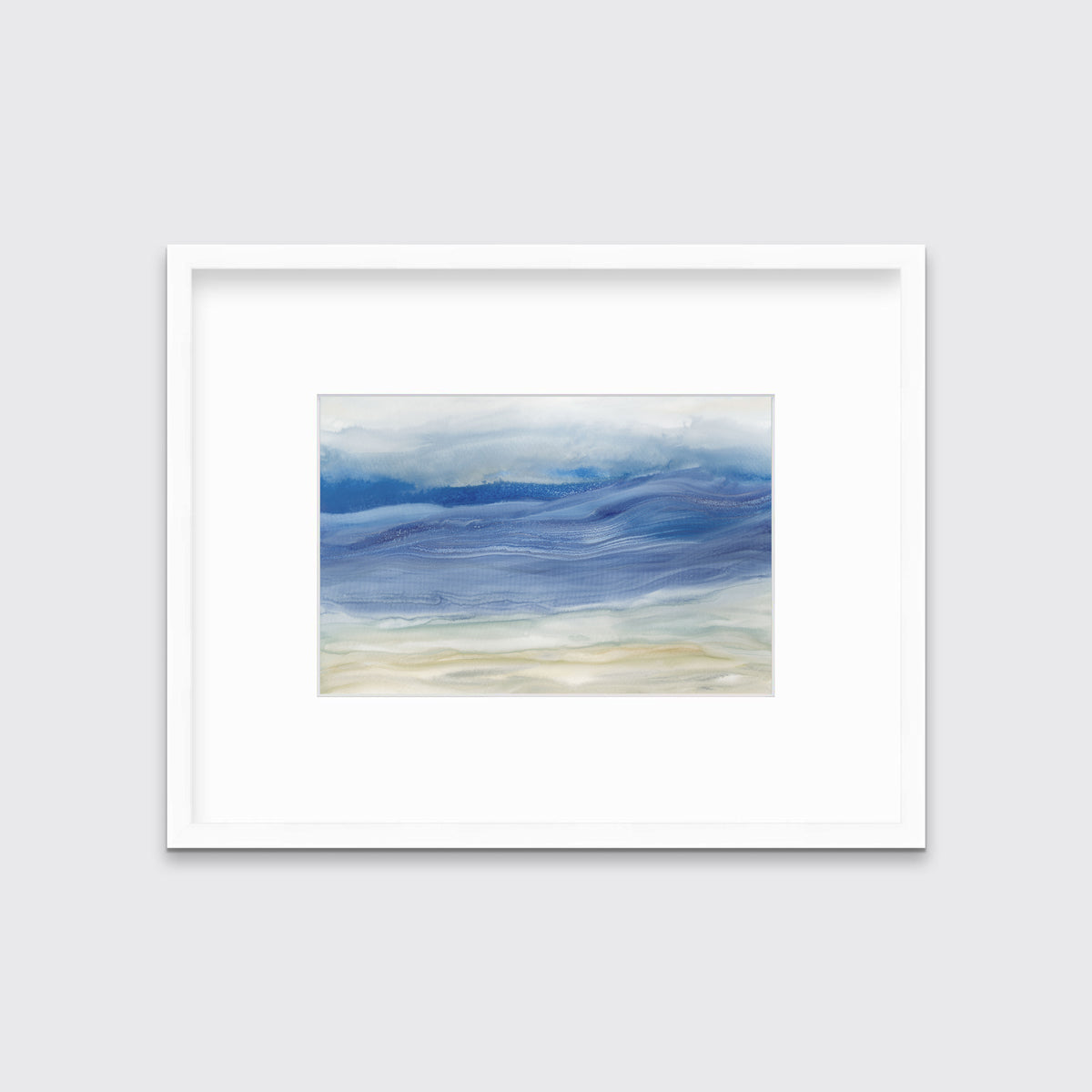 A blue, white and beige abstract print in a white frame with a mat hangs on a white wall.