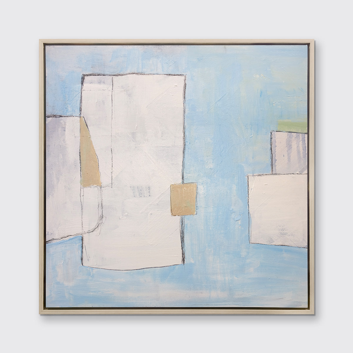 A blue, white and beige abstract print in a white oak wood floater frame hangs on a white wall.
