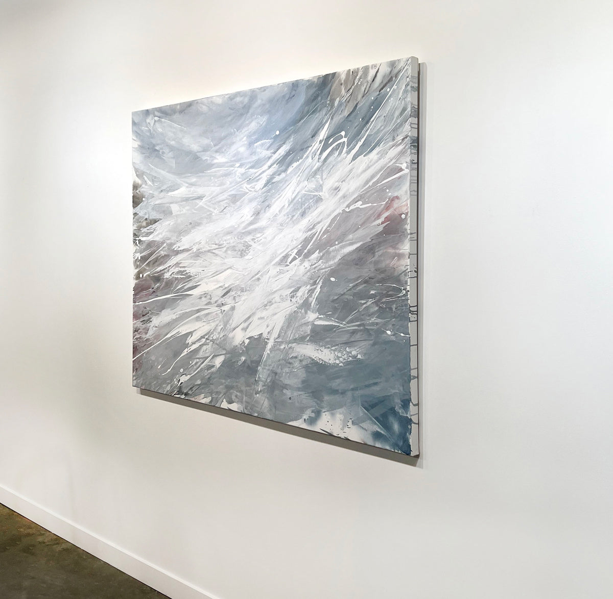 An original Teo Guererra abstract painting on the wall, side view.