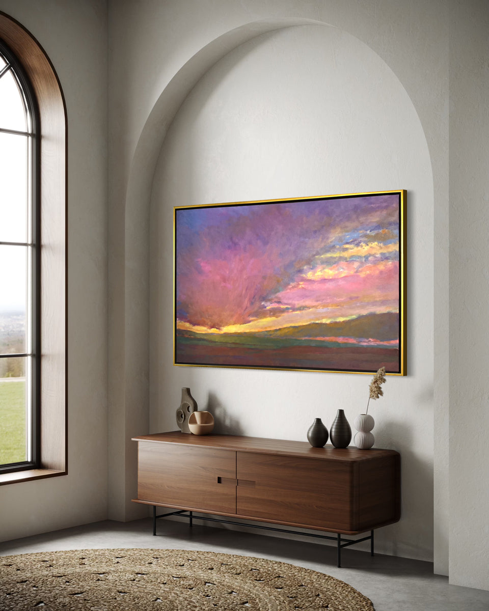 Modern living room with a wooden sideboard, decorative vases, and a colorful abstract painting on the wall.