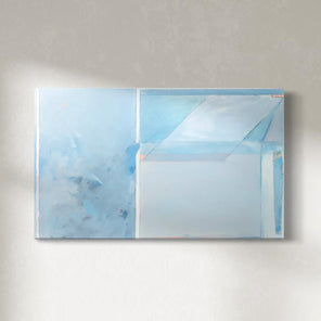 A blue abstract painting hangs on a white wall. 