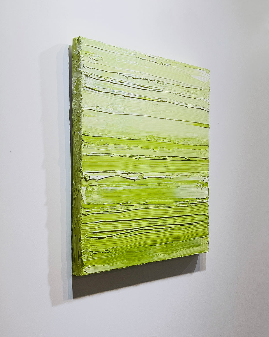 A left side-view of a textured green and white abstract painting by Teodora Guererra.