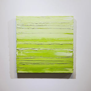 A textured green and white abstract painting by Teodora Guererra hangs on a white wall.
