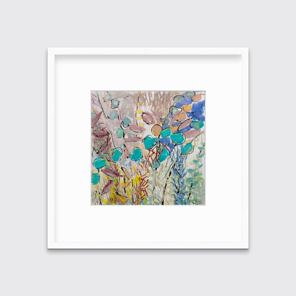 A blue, pink and yellow abstract floral print in a white frame with a mat hangs on a white wall.