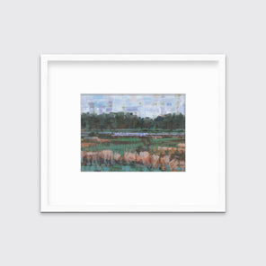 A green, orange and blue abstract landscape print in a white frame with a mat hangs on a white wall.