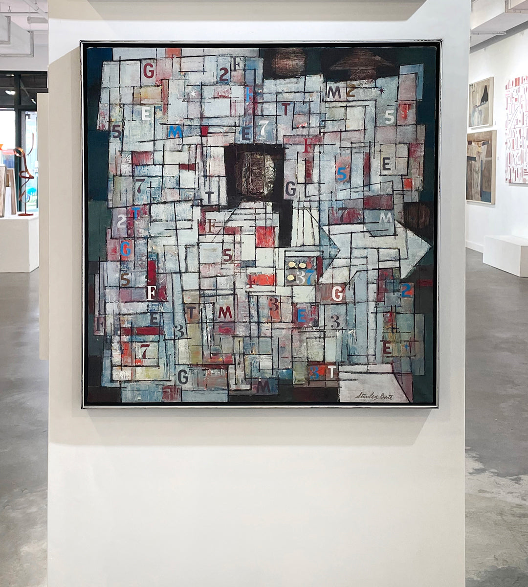 Abstract artwork with geometric shapes and text in a gallery setting