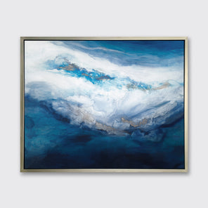 A blue, white, gold and teal abstract print in a silver floater frame hangs on a white wall.