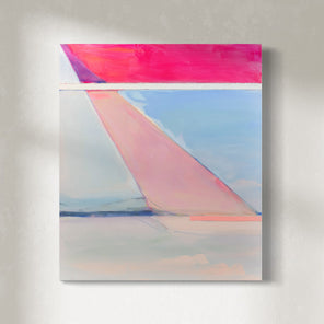 A pink and blue abstract painting hangs on a white wall. 