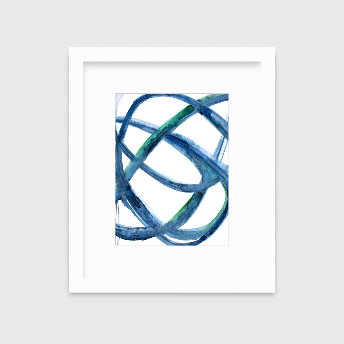 A blue, green and white abstract print in a white frame with a mat hangs on a white wall.