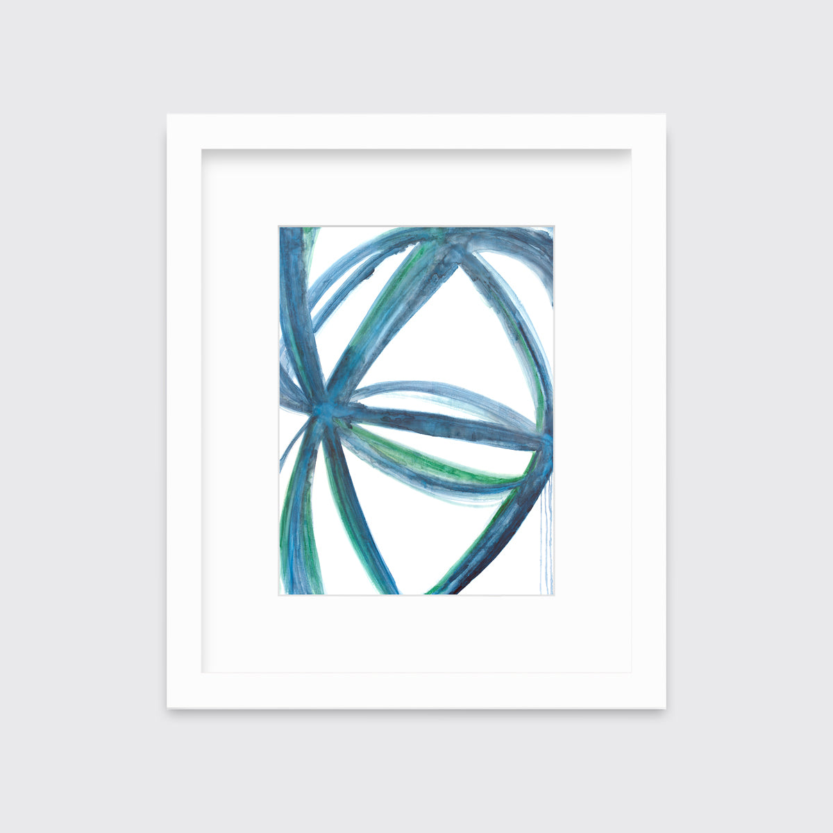 A blue, green and white abstract print in a white frame with a mat hangs on a white wall.