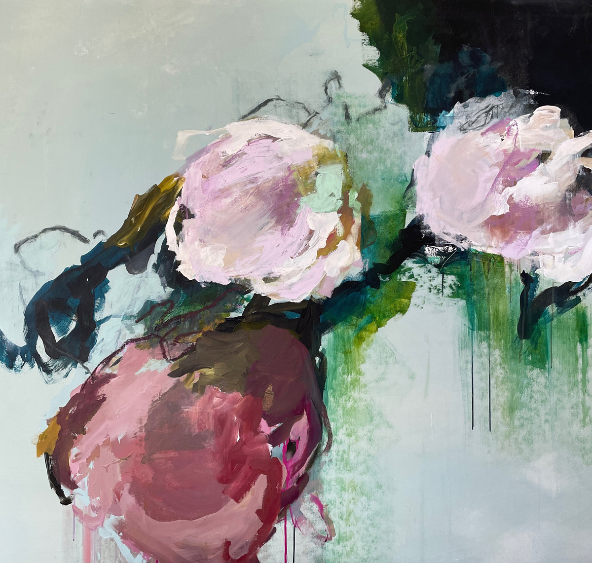Abstract painting of flowers with pink and red petals on a light background