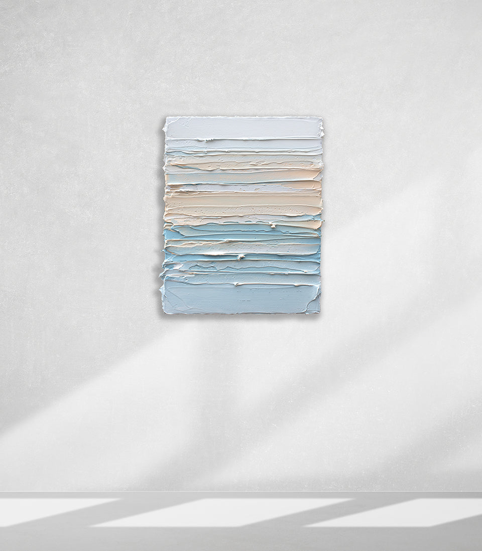 A white, orange sherbet, and teal blue thick textured painting on a white wall in natural light by Teodora Guererra.