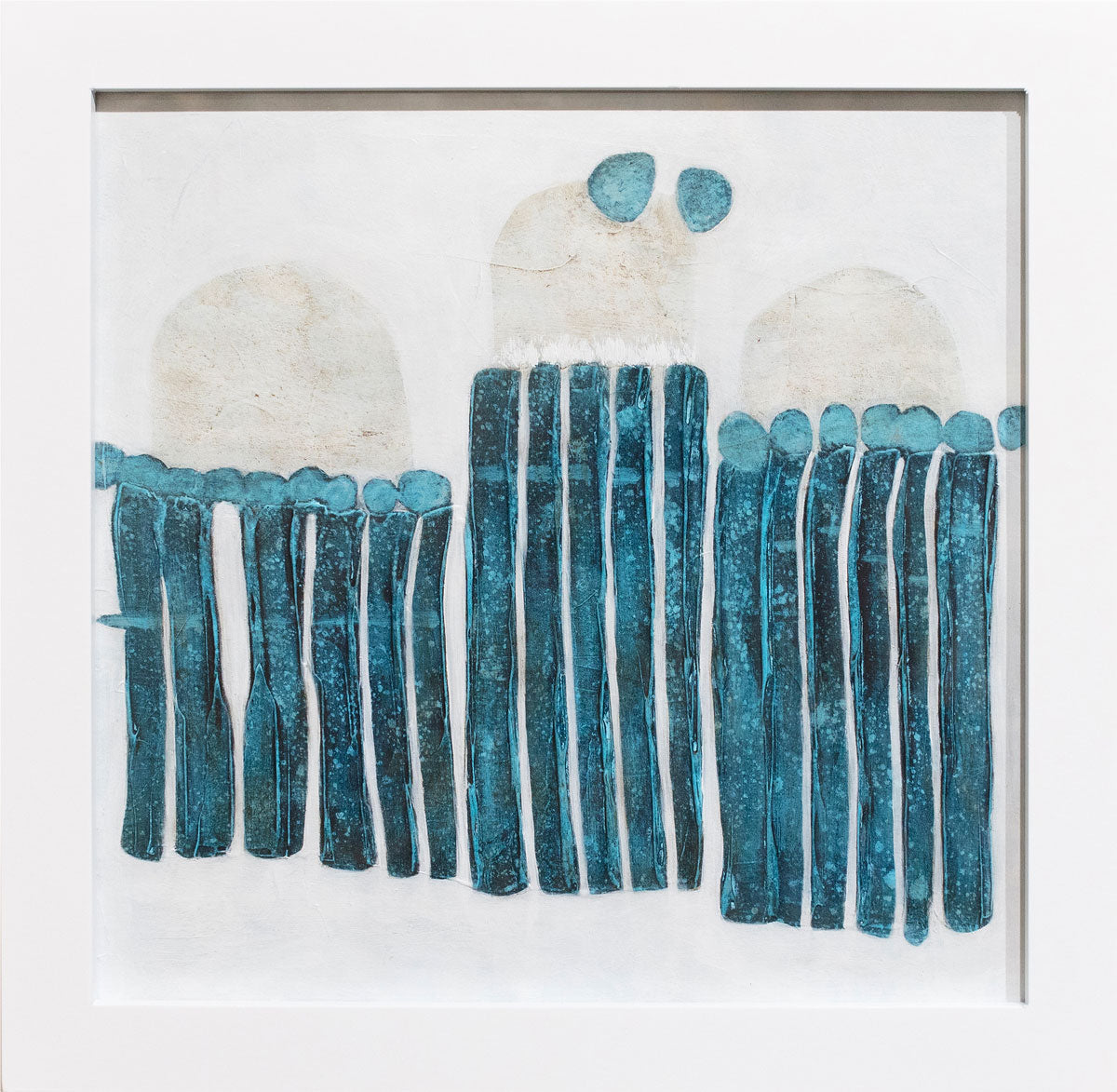 A blue, white, and beige abstract painting framed in a white frame.