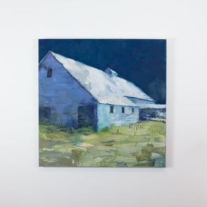 A blue and green contemporary landscape painting of a barn hangs on a white wall. 