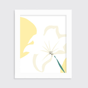 A light yellow abstract botanical art print in an unmatted white frame hangs on a white wall.