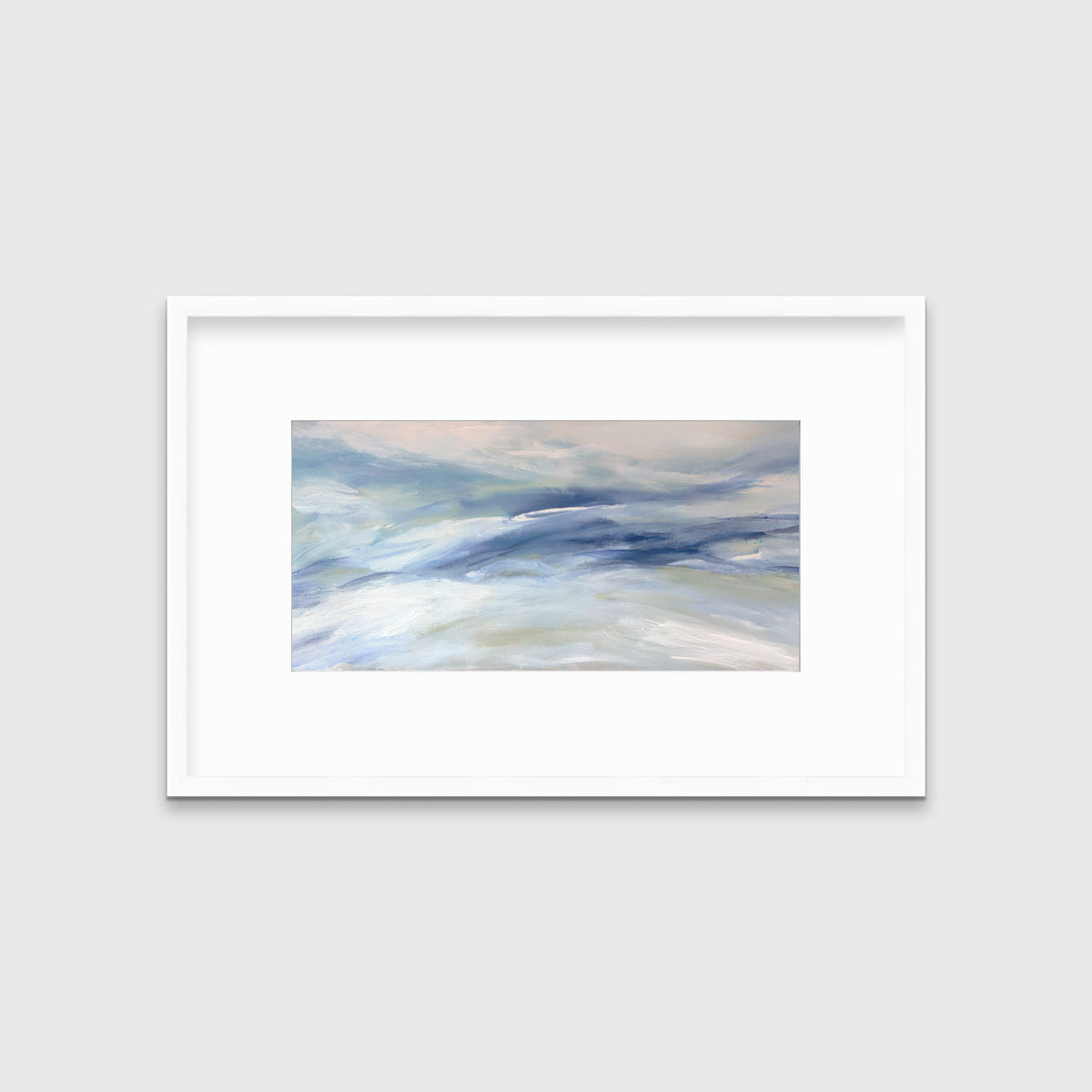 A blue, white and light green abstract print in a white frame with a mat hangs on a white wall.