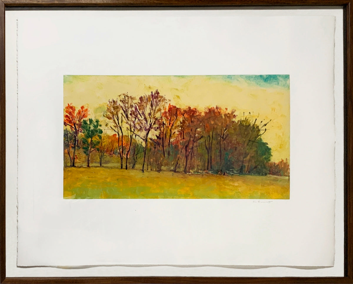 Framed painting of a landscape with trees and a yellow sky.