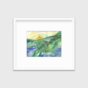 A yellow and green landscape illustration print framed in a white frame with a mat hangs on a white wall.