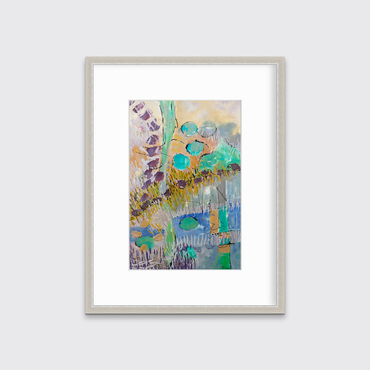 A teal, orange, purple and yellow abstract landscape print in a silver frame with a mat hangs on a white wall.