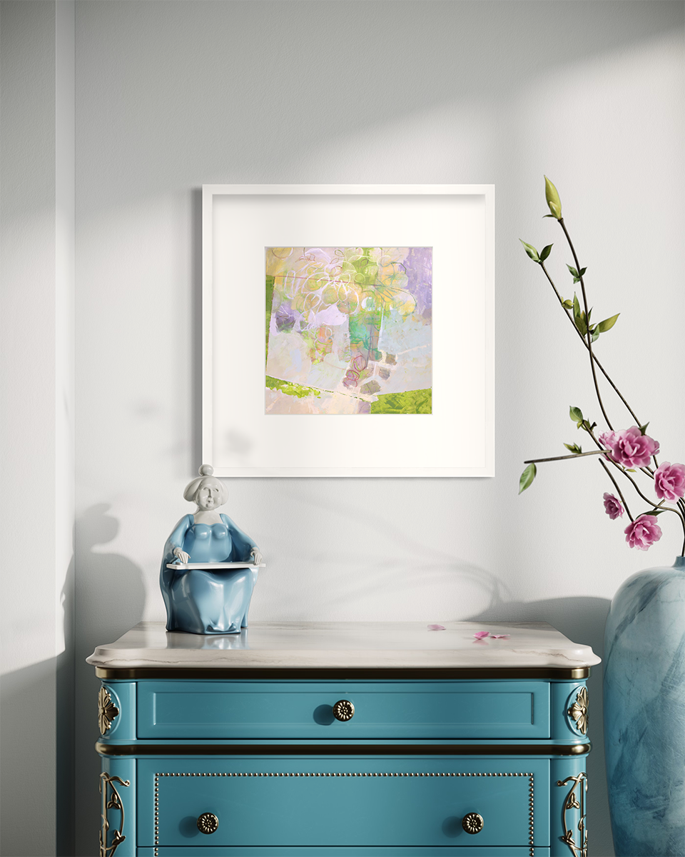 A light yellow, lavender and green abstract floral print in a white frame with a mat hangs on a white wall above a teal cabinet with a porcelain figurine and a large floor vase with rose stems.