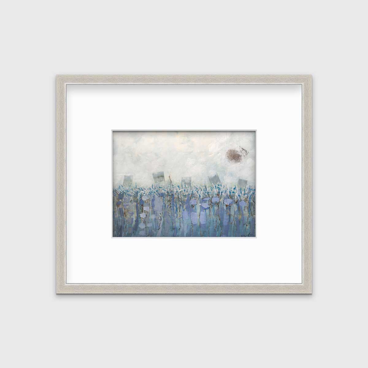 A beige, teal and lavender abstract print in a silver frame with a mat hangs on a white wall.