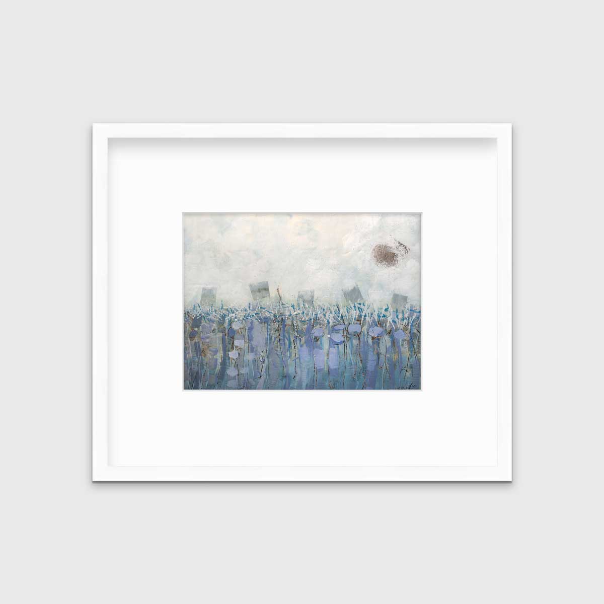 A beige, teal and lavender abstract print in a white frame with a mat hangs on a white wall.