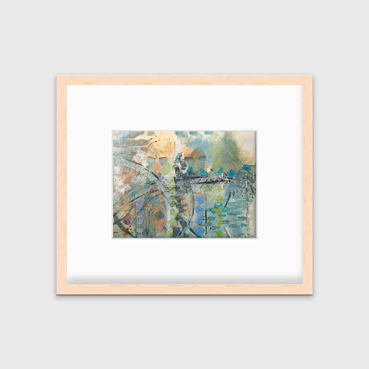 A blue, green, orange and black abstract print in a natural wood frame with a mat hangs on a white wall.