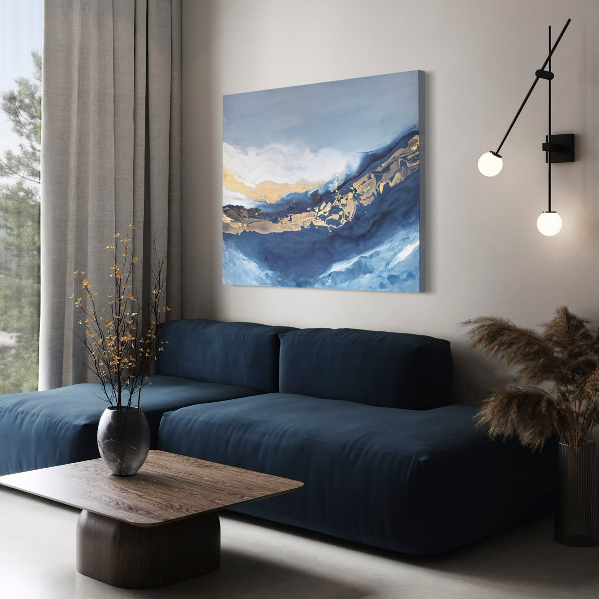 Modern living room with a blue sofa, abstract painting, and decorative elements.