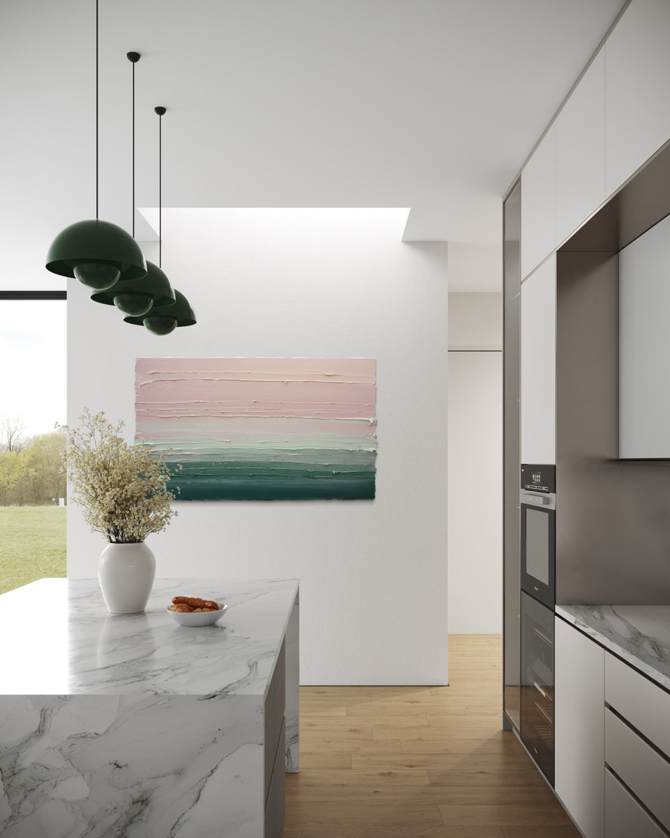 Modern kitchen interior with marble countertop, original abstract painting by Teo Guererra on wall, and stainless steel appliances.
