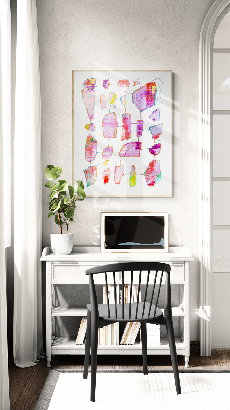 Modern home office with a desk, chair, and colorful abstract art on the wall.
