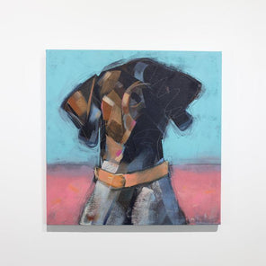 An blue, brown, and pink abstracted painting of a dog hangs on a white wall. 