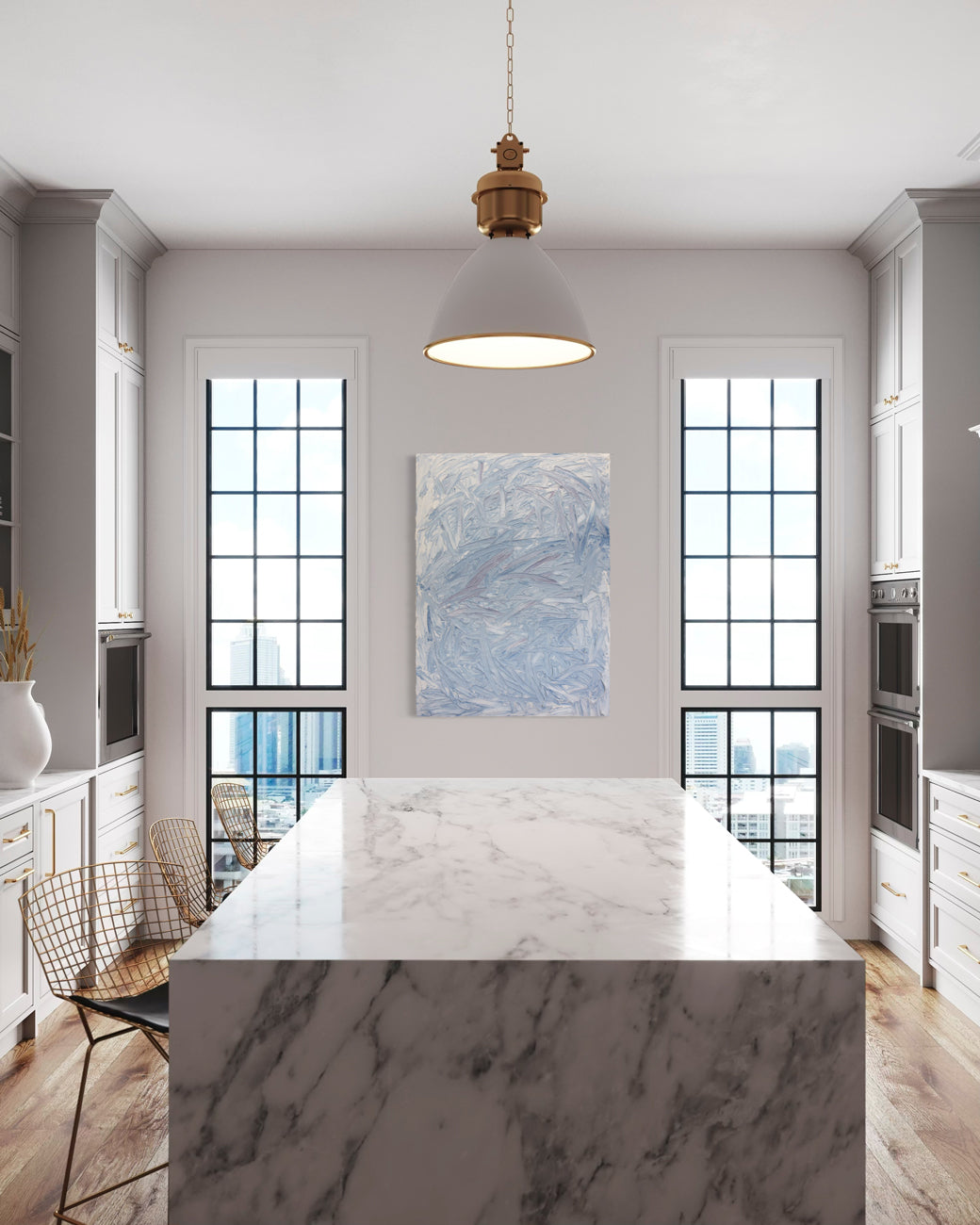 Modern kitchen with marble island, pendant light, and large windows.