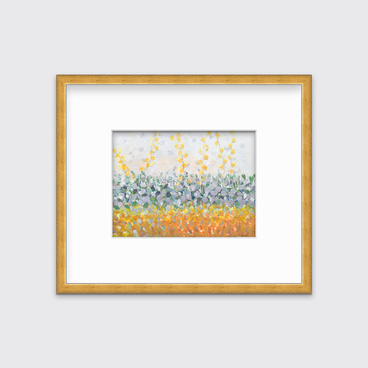 A yellow, purple, green and orange abstract print in a gold frame with a mat hangs on a white wall.