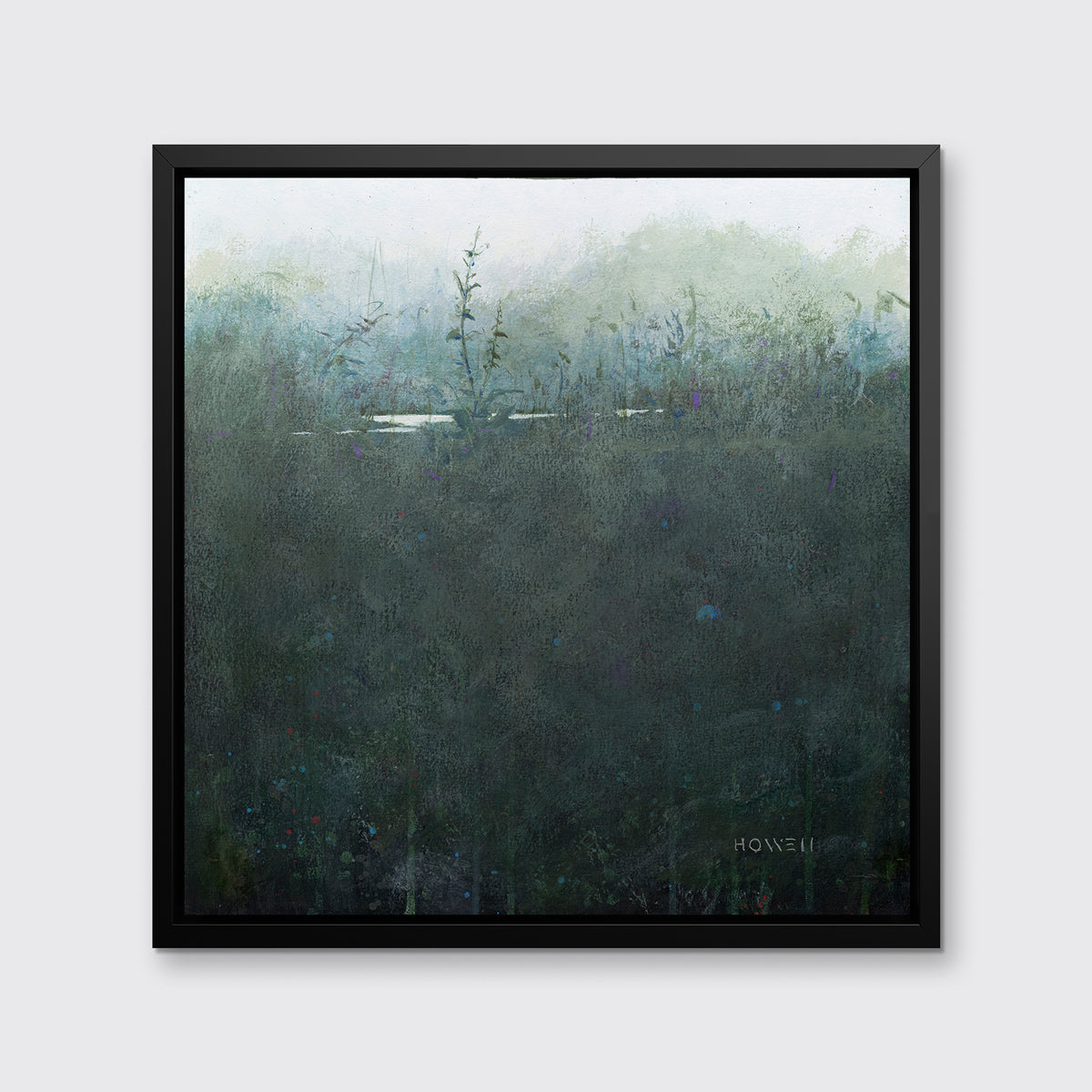 A dark muted teal abstract landscape print in a black floater frame hangs on a white wall.
