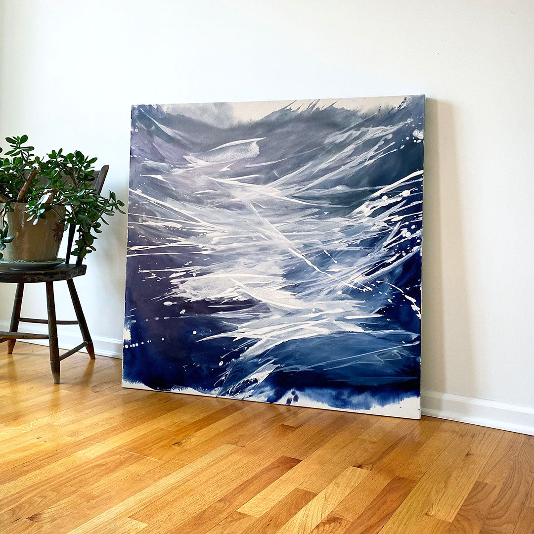 An original abstract painting by Teo Guererra in her studio leaning against a wall.