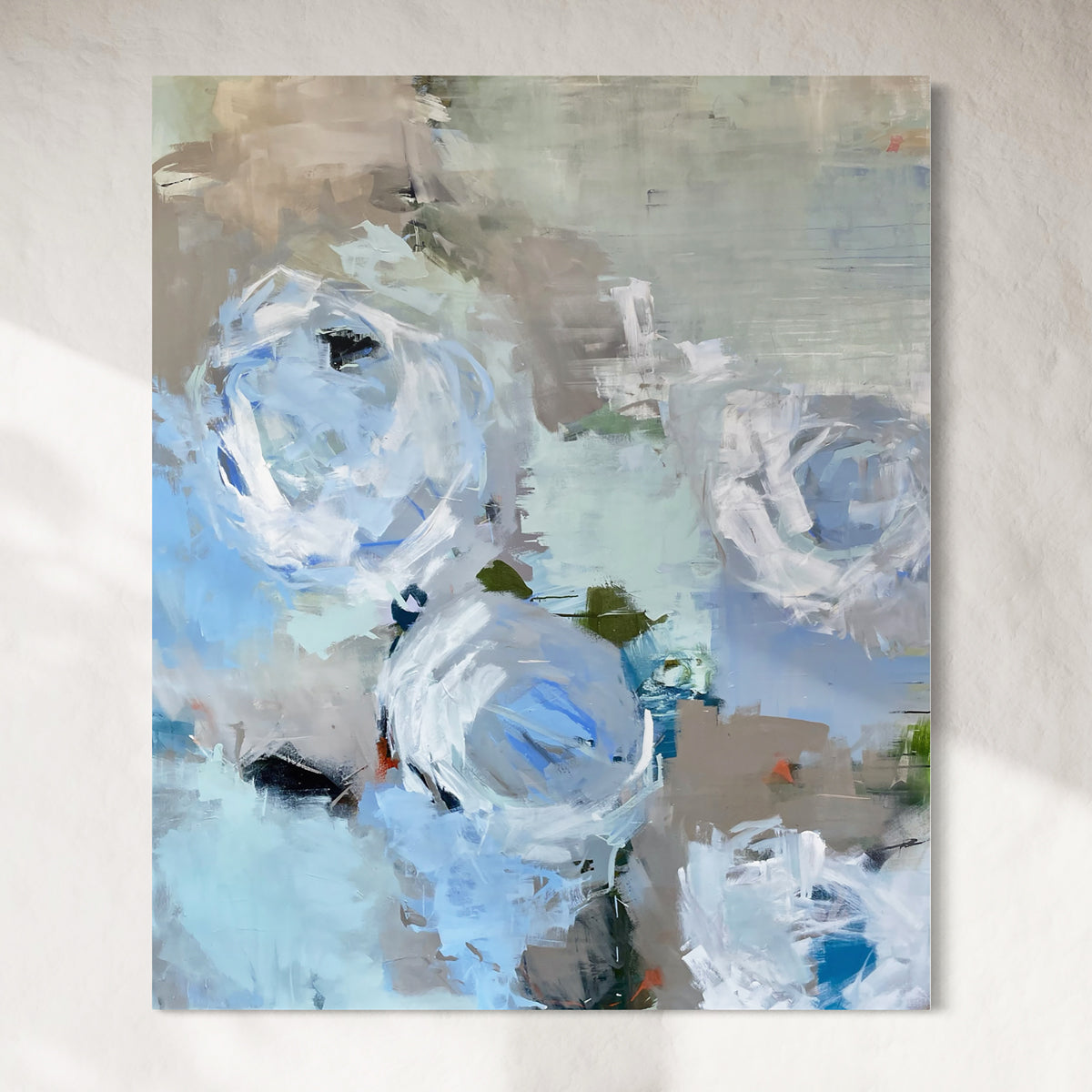Abstract painting of flowers with blue and white tones on a light gray background