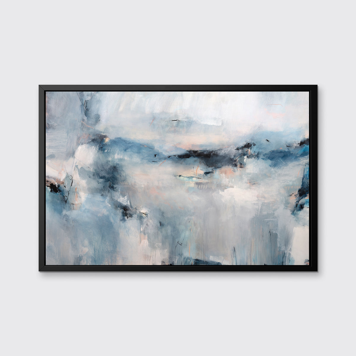 A blue and white abstract print in a black floater frame hangs on a white wall.