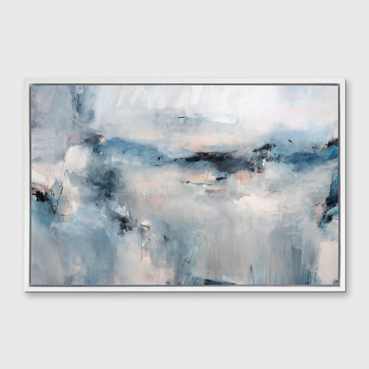 A blue and white abstract print in a white floater frame hangs on a white wall.