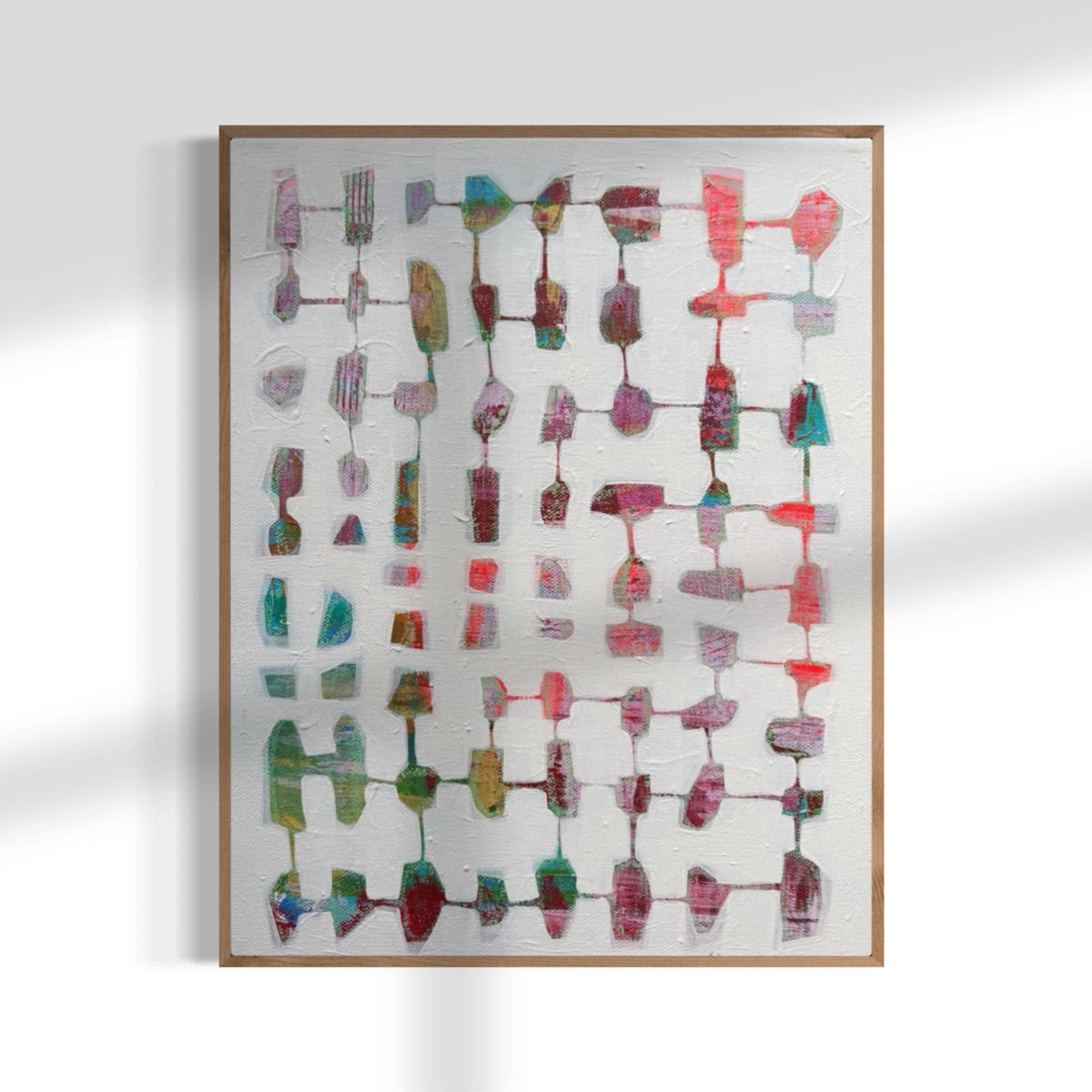 Abstract art piece with colorful geometric shapes on a white background.