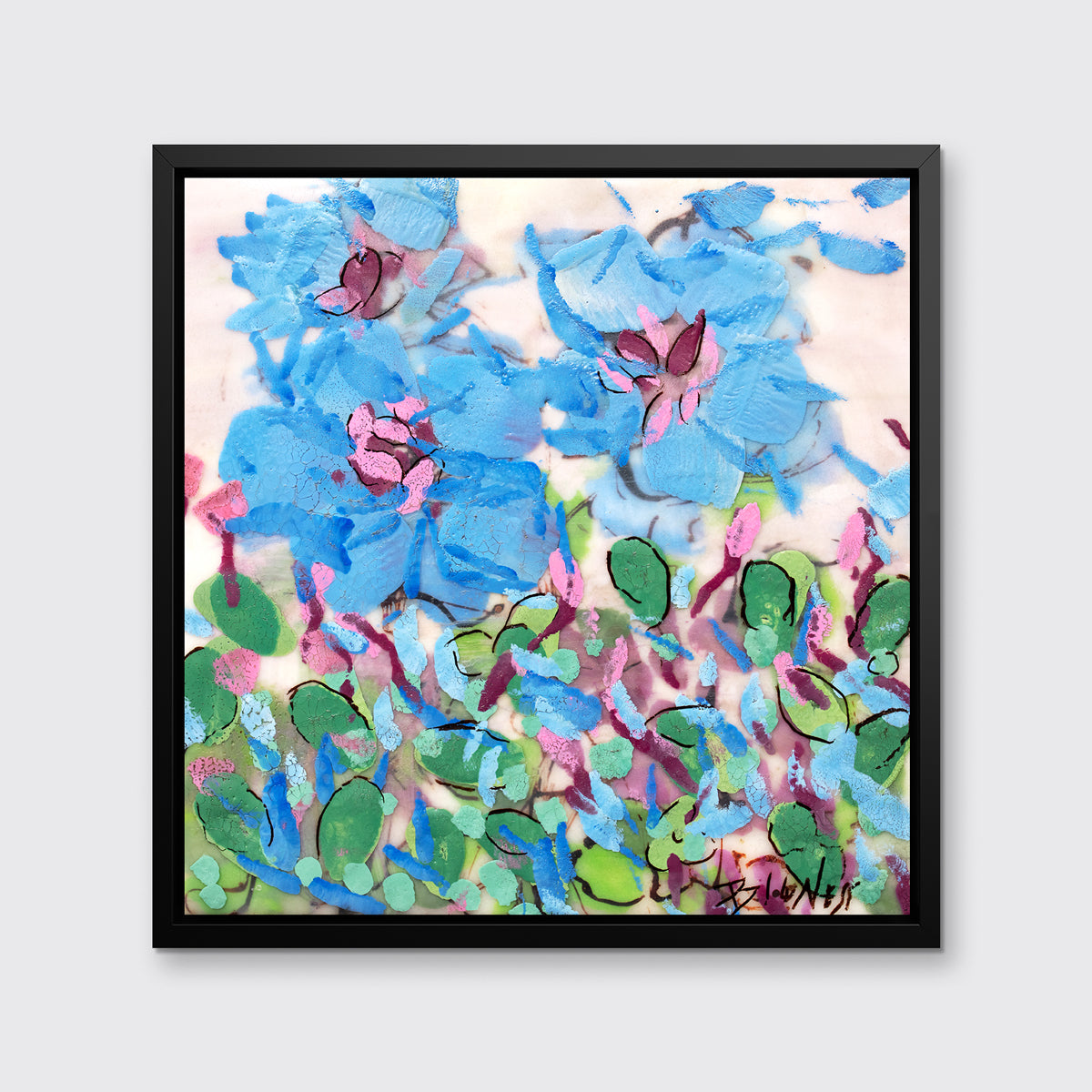 A blue, pink, green and white abstract floral print in a black floater frame hangs on a white wall.
