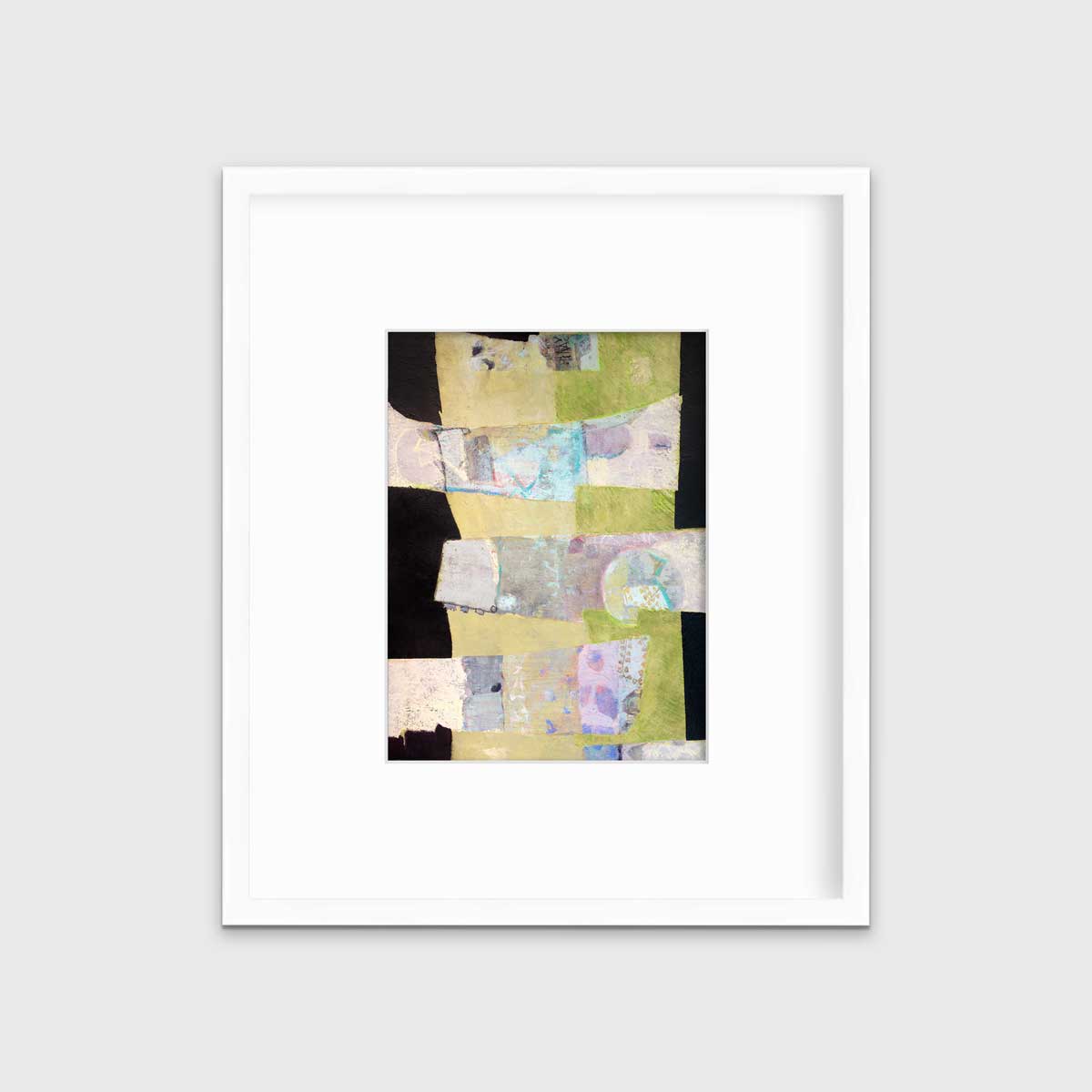 A green, black and beige abstract print by Christine Averill-Green in a white frame with a mat hangs on a white wall.
