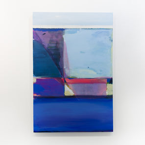 A blue abstract painting hangs on a white wall. 